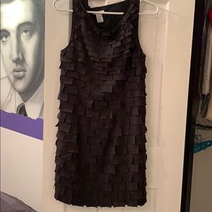 Black dress with adorable flaps